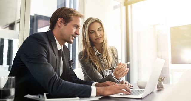 Academic Leadership. Shot of a two executives working together in an office