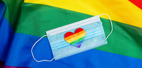 LGBTQ+ flag with mask and heart