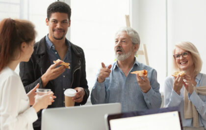 Group of academic leaders all talk with one another