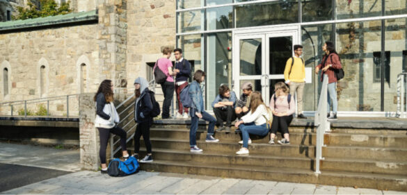 Group of students outside university building