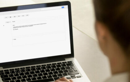 woman-working-at-laptop-with-email-open