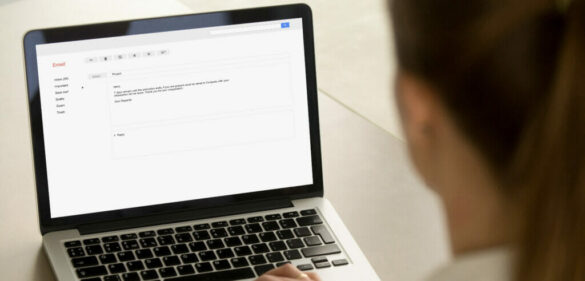 woman-working-at-laptop-with-email-open