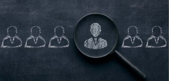 illustration-of-silhouettes-of-head-and-shoulders-with-magnifying-glass-over-one