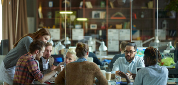 Big team discussing business plans at meeting