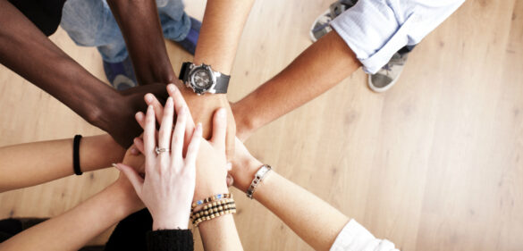 diverse-hands-all-in-a-circle-together-on-top-of-each-other