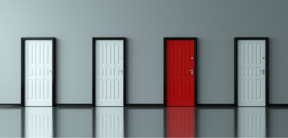 multiple doors-against-wall-three-white-doors-one-red