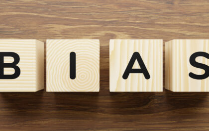 letter-blocks-on-wooden-table-spelling-the-word-bias