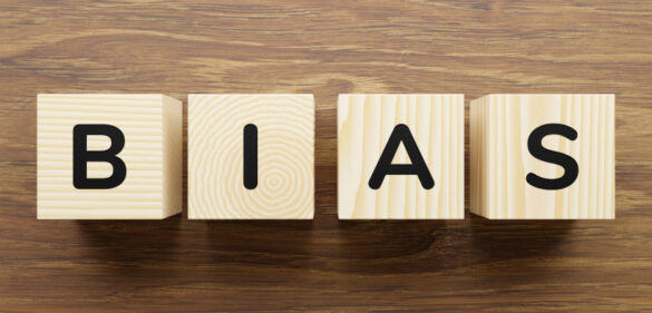 letter-blocks-on-wooden-table-spelling-the-word-bias